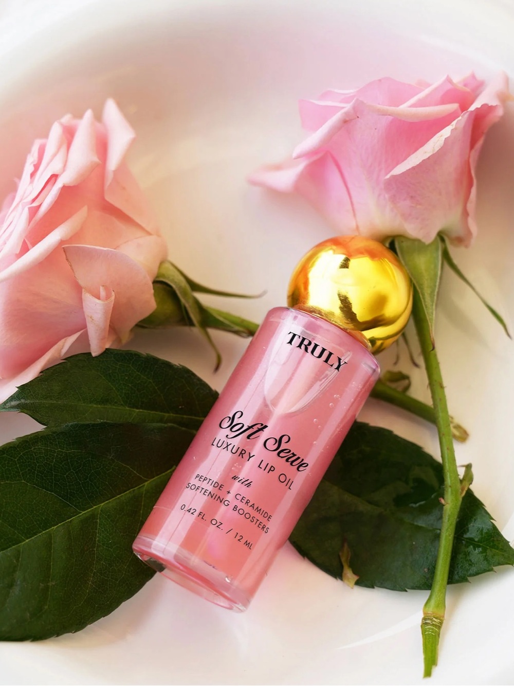 NEW Truly Luxury Peptide Lip Oil
Plumping Lip Oil